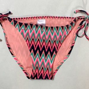 Xhileration chevron string bikini bottom, NEW without tags. Size Medium